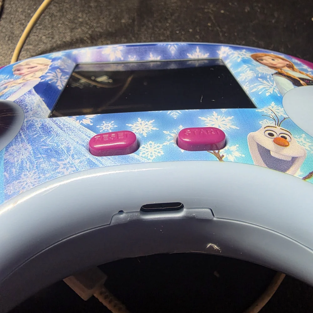 Frozen Bilingual Handheld Game Console - Purple and Blue 100 Games